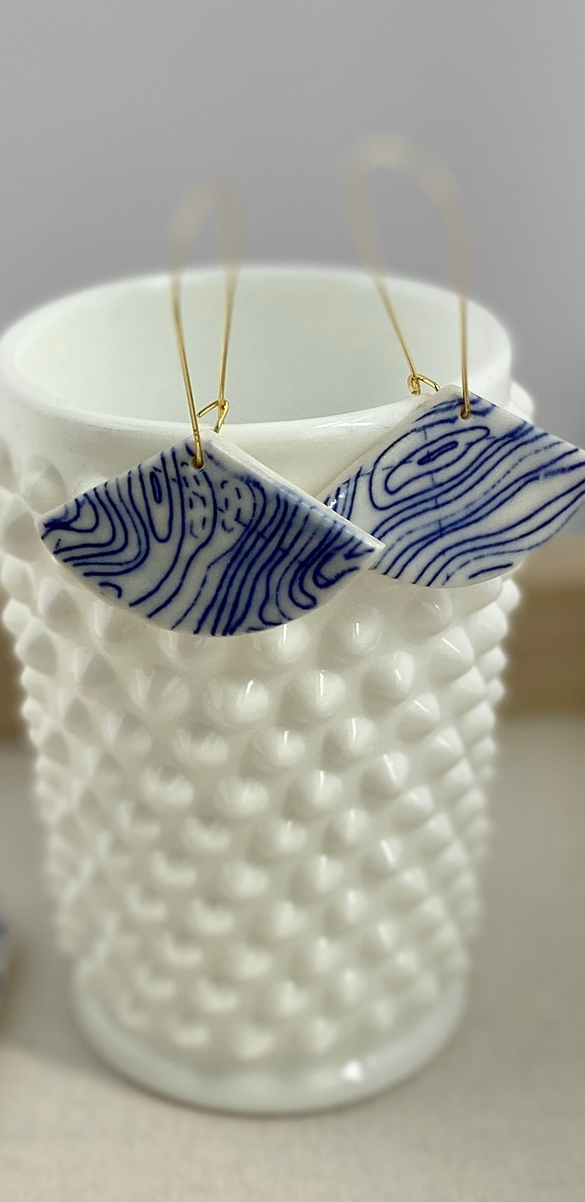 Porcelain geometric Blue and White Fan shaped hanging earring. "Topographic"