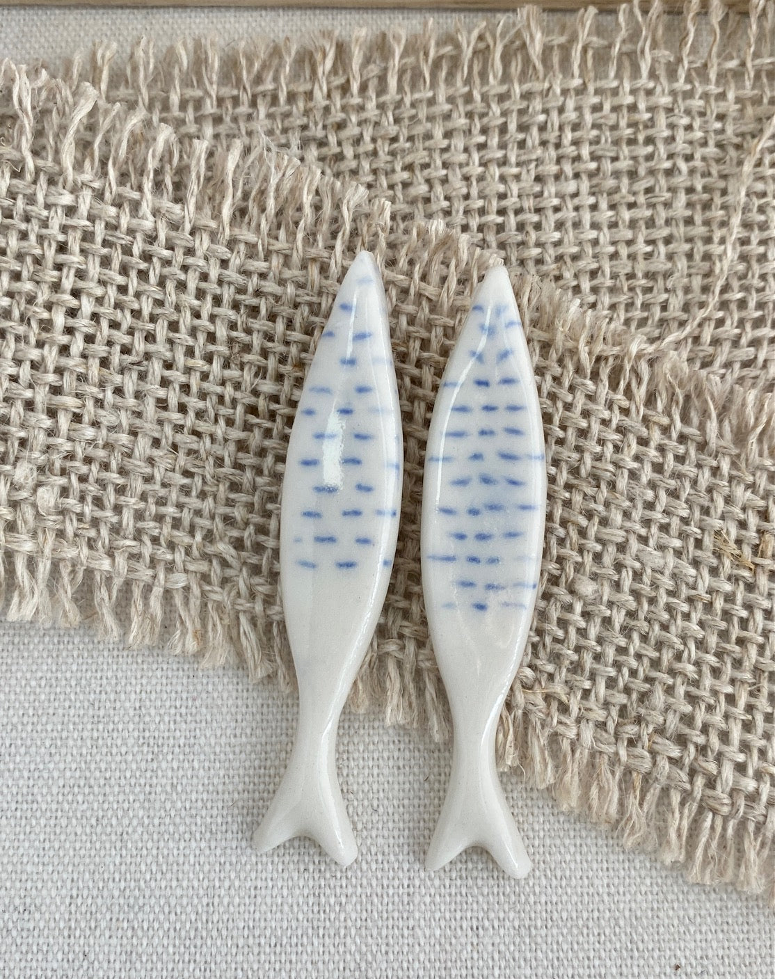 Fish shaped porcelain stud earring.